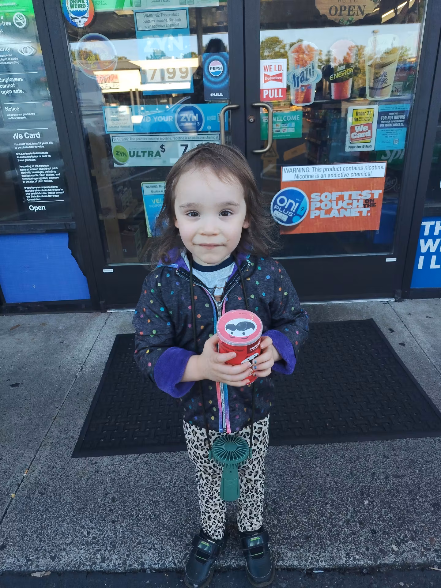 After sister was picked up for school, we walked to a convenience store and my lad picked out some chips.